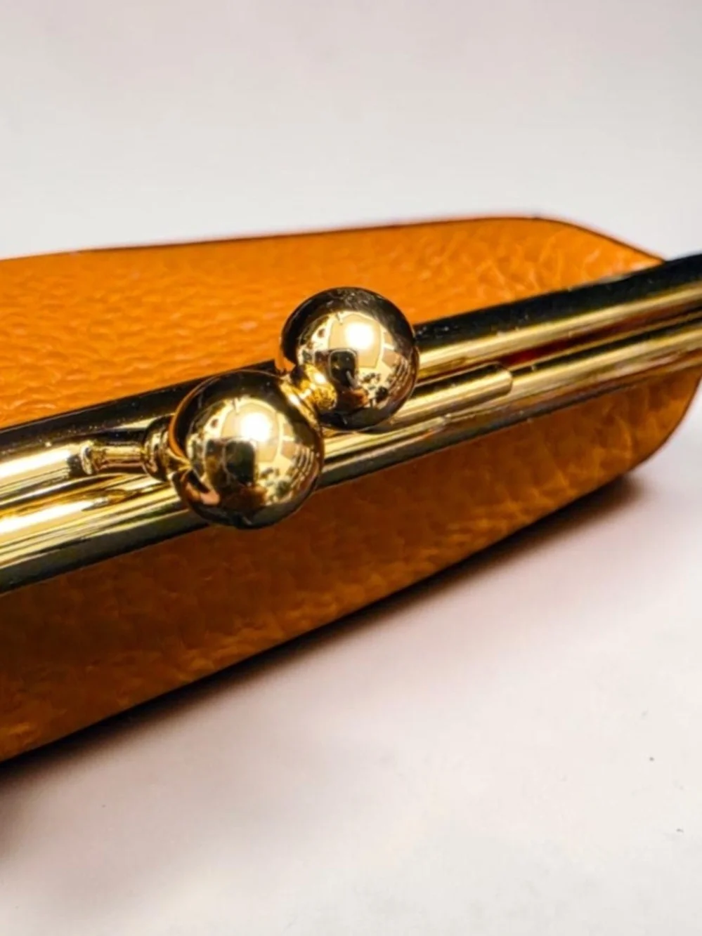 Dooney and Bourke Classic Pebbled Leather Coin Purse in Cognac
